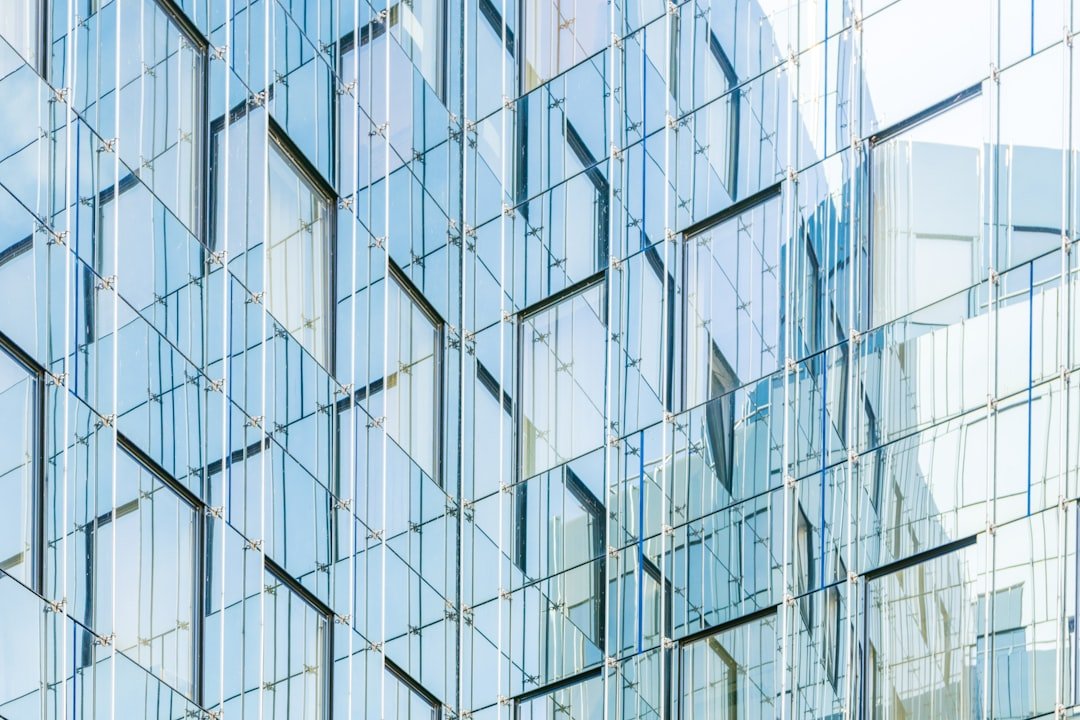 Glass curtain wall facade of a commercial high-rise building